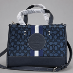 Coach Dempsey Carryall bag in signature Jacquard